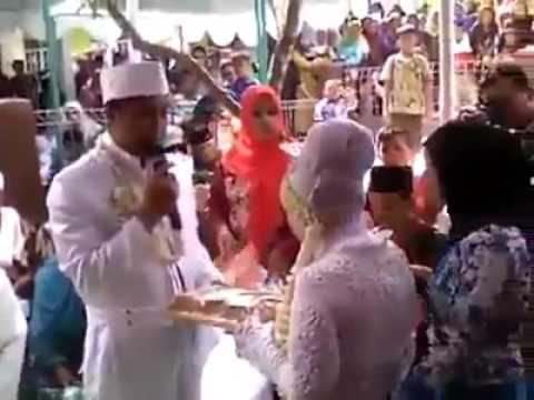 بالفيديو عروس القرآن هدية عريس ماليزي إلى زوجته في حفل زفافهما