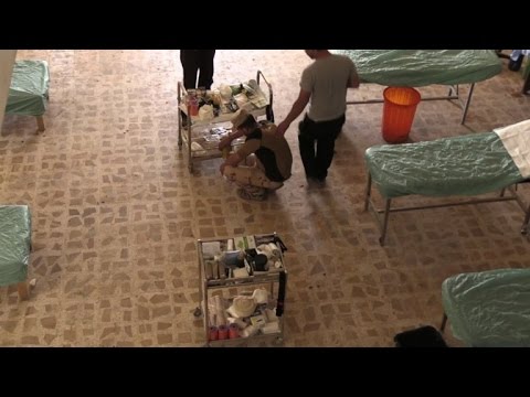 بالفيديو ​​تحويل مدرسة في الموصل إلى مستشفى ميداني