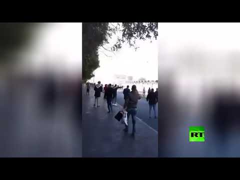 شاهد  صدامات بين محتجين وقوات الأمن جنوب العراق