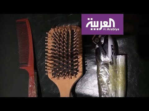 شاهد الحلاقة عن بُعد في أحدث طريقة للوقاية من كورونا في الصين
