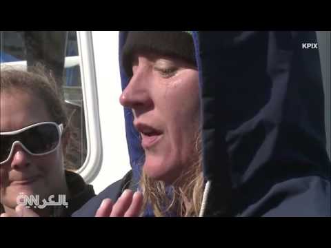 بالفيديو كيم أول سباحة في العالم تتحدَّى أسماك القرش