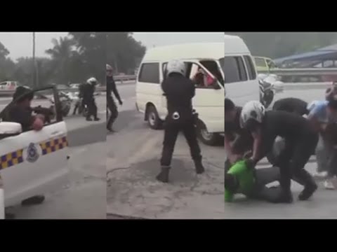 شاهد الشرطة تطارد عصابة على الطريقة الماليزية