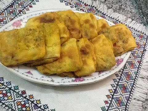 شاهد تحضير رغيف معمر بالفلفلة والكفتة