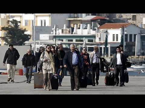 turkish officials arrive on lesbos to oversee eu deal on migrants