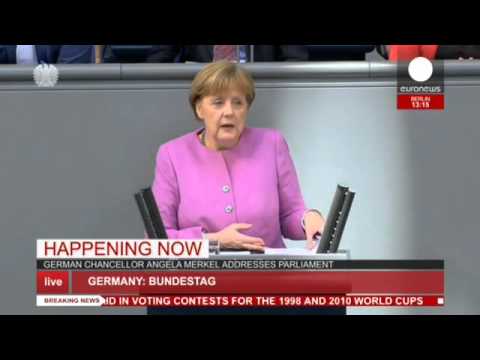 angela merkel addresses parliament on refugee crisis