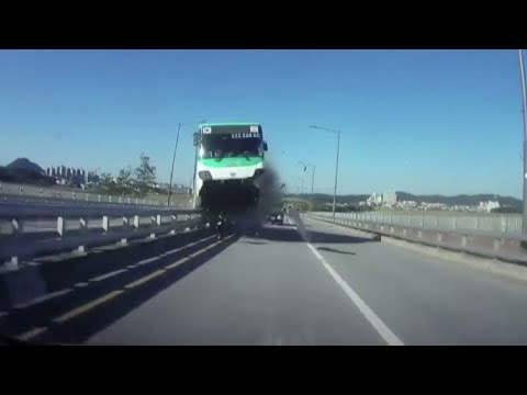 korean bus crashes into bridge barrier