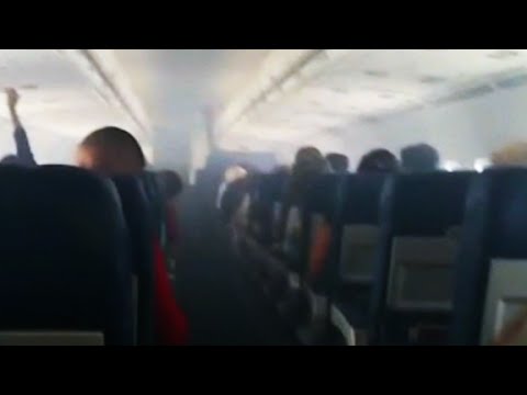 flight diverted after smoke fills plane cabin