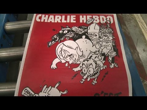 charlie hebdo team bites back with new issue