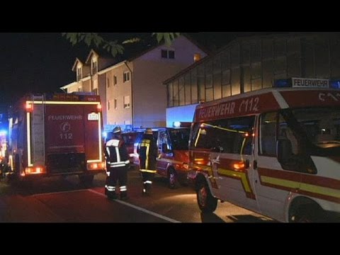fire tears through refugee shelter in germany
