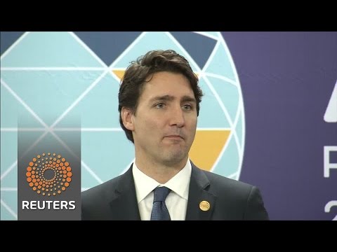 canadas prime minister is whisked away by security staff
