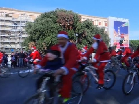 bikers dressed as santa deliver kids gifts