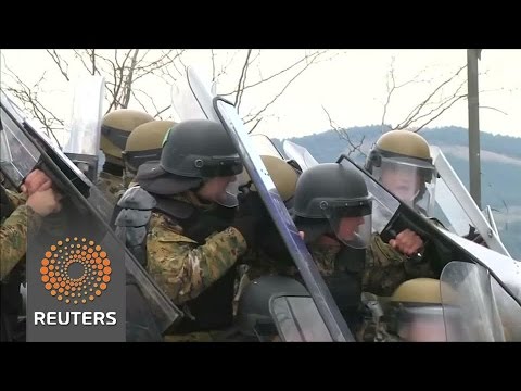 migrants clash with macedonian police at the greek border