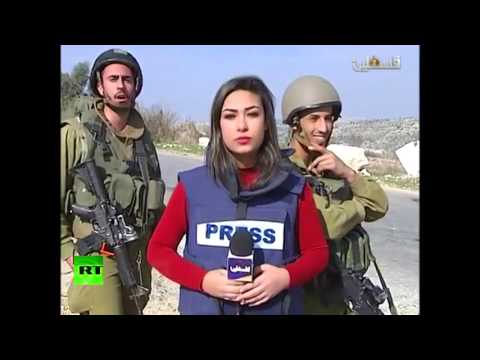 idf soldiers trolling palestinian news reporters live broadcast