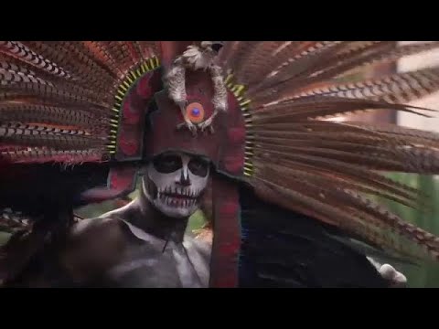 giant skeletons and dancing devils mexico holds