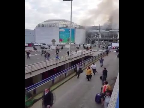 100s flee wrecked brussels airport