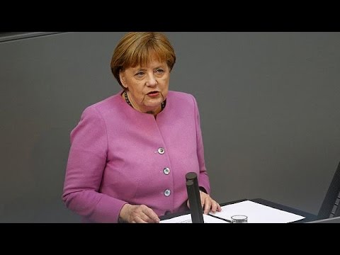 migrants what merkel said to her parliament