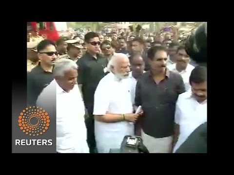 modi visits injured from indian temple blaze