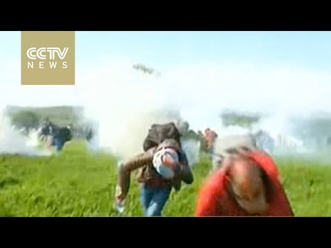 macedonian police uses tear gas on migrants