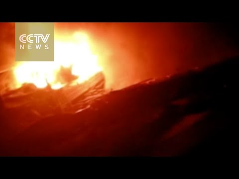 truck carrying four people hurtles over cliff on highway