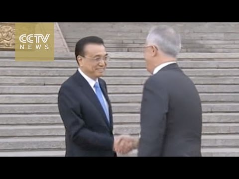 chinese premier welcomes australian pm in beijing