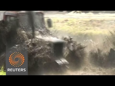 drivers compete in russian tractor races