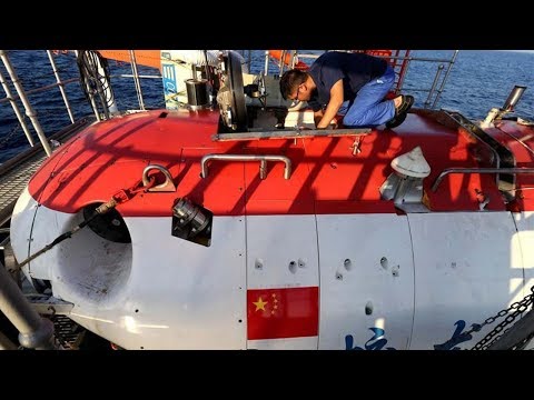 jiaolong completes dive at world’s deepest point