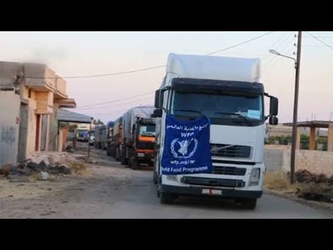 first aid convoy enters besieged city of houla