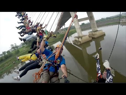 245 people set mass bungee jump record