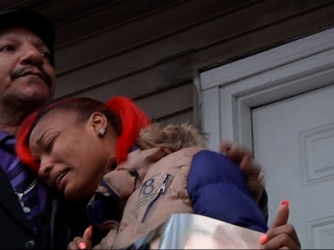 vigil draws 100 to home where 2 shot